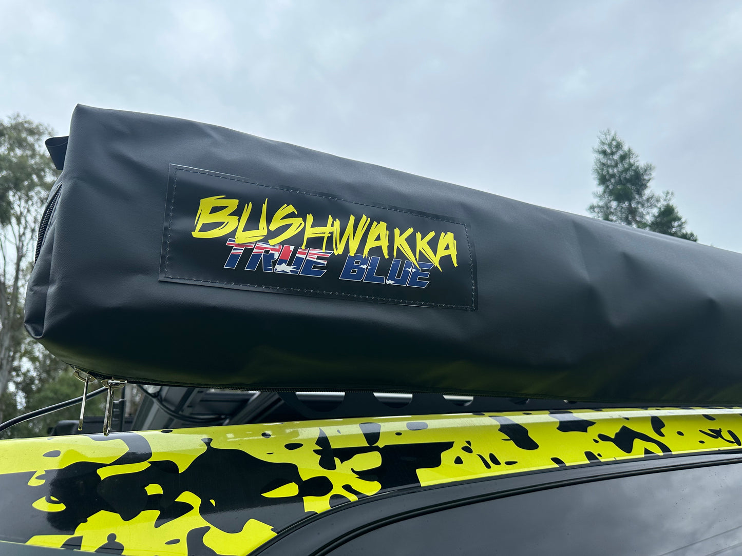 close up of bushwakka logo on rooftop tent from true blue range